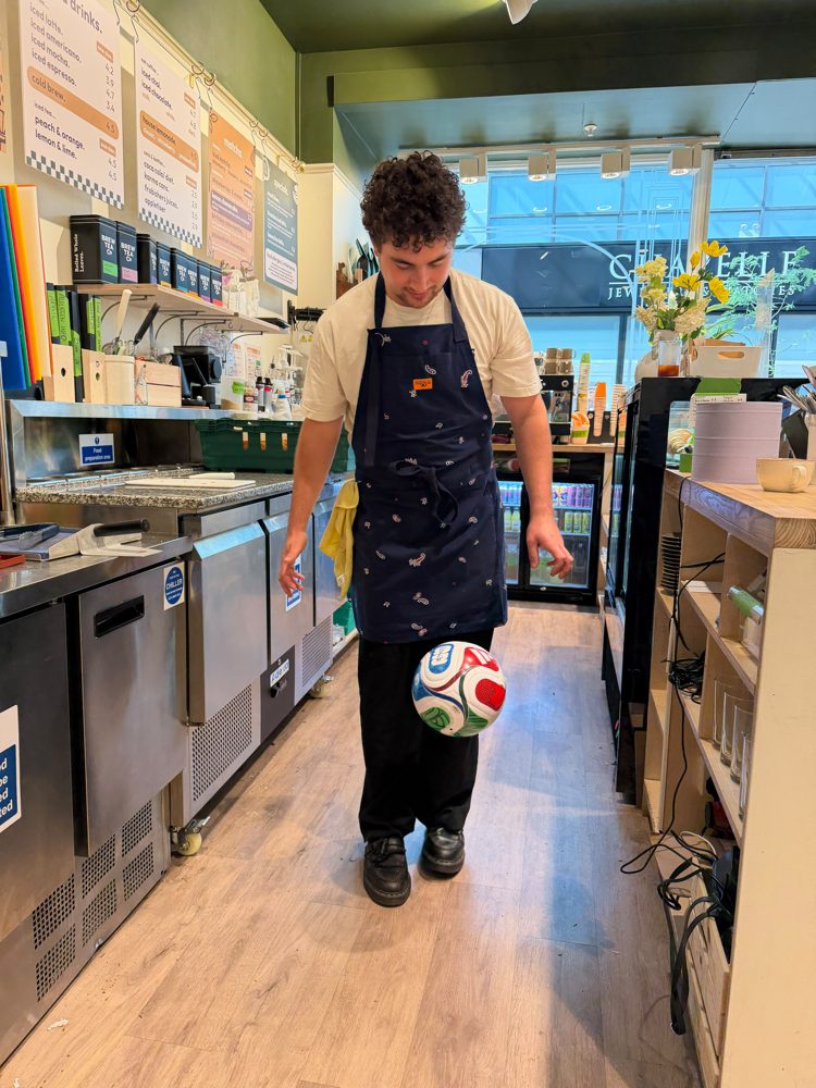 One of the brew'd baristas at the machine